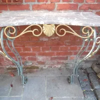 Marble console on iron painted and guilded frame . 250 euro .84 cm wide , 78 cm hi , 43 cm deep .